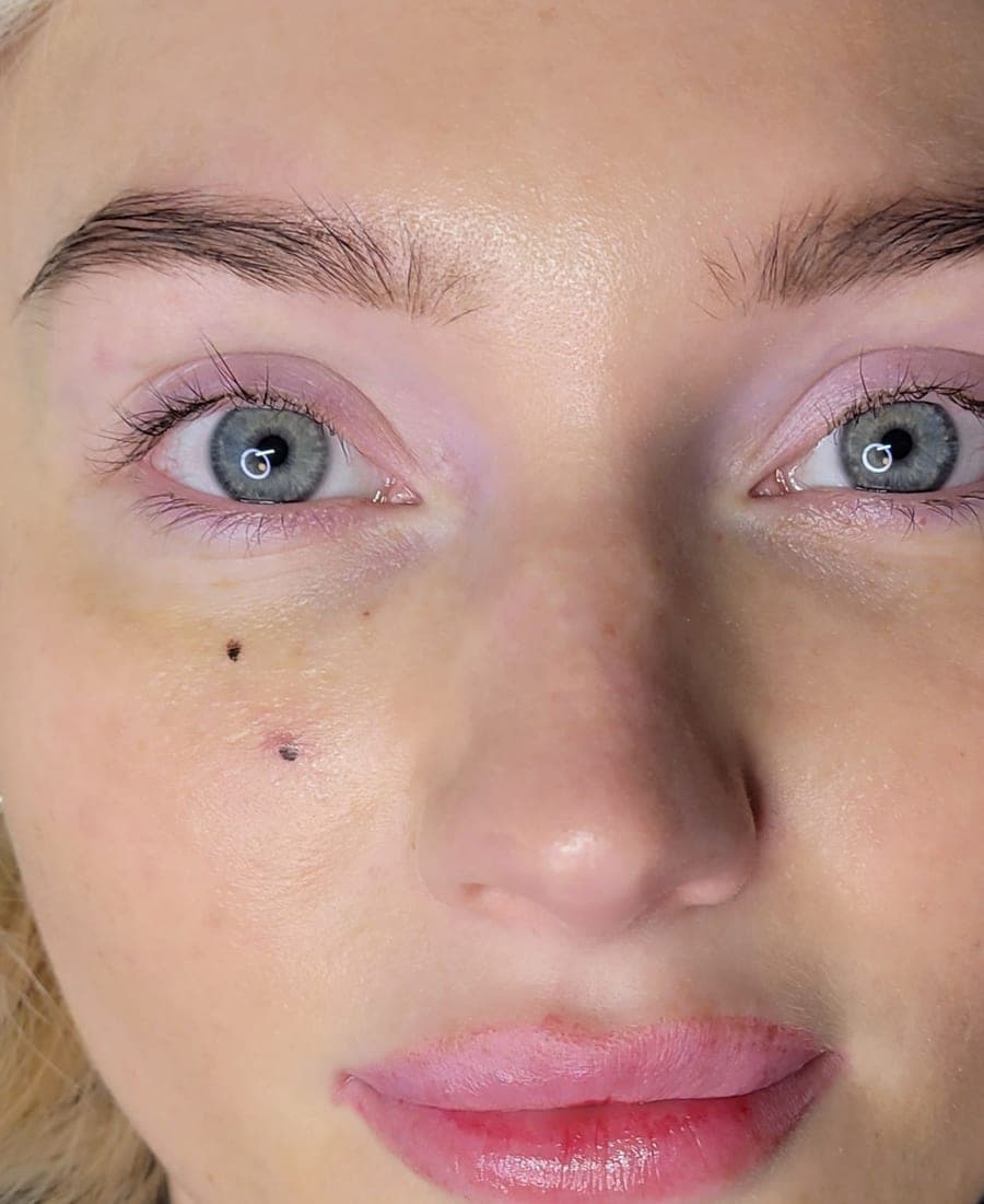 A client's lashes and brow before treatment