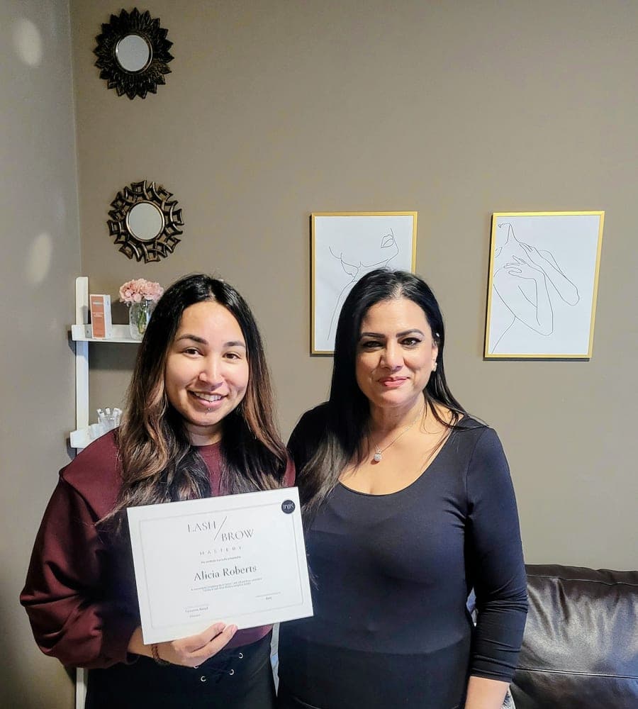 A graduate receiving her certification