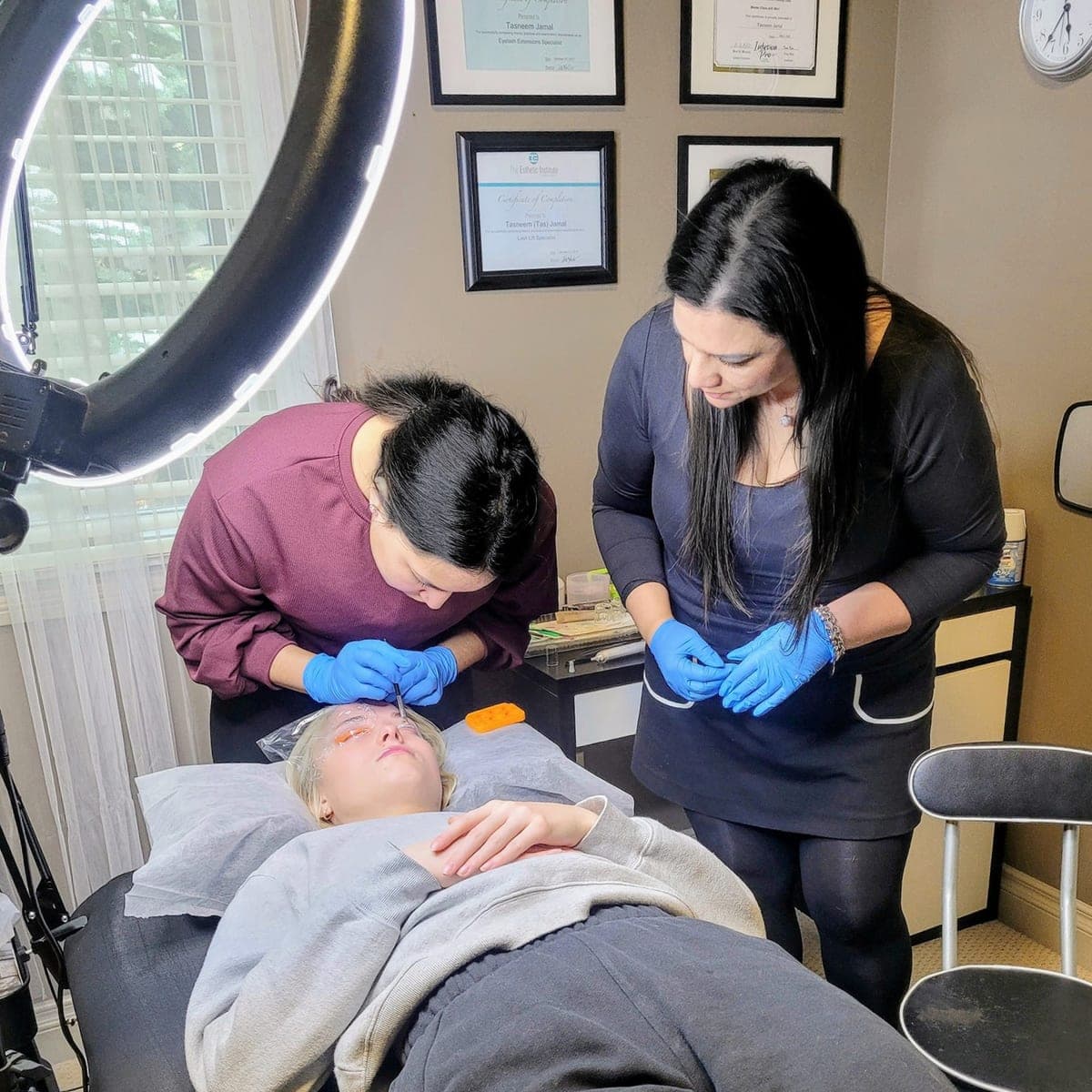 A hands-on lash training session in progress